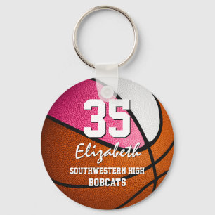 Rosa, weiße Mannschaftsmädchen Basketball Schlüsselanhänger
