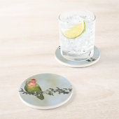 Rosaroter Liebesvogel auf dem Zweig Getränkeuntersetzer (Seite)