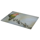 Rosaroter Liebesvogel auf dem Zweig Schneidebrett (Ecke)