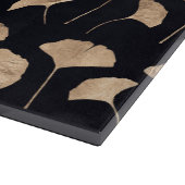 Rose Gold Ginko Blätter schwarzer Hintergrund Schneidebrett (Ecke)