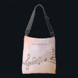 Rose Gold Musiknoten Musikername Tragetaschen Mit Langen Trägern<br><div class="desc">Einfach und elegant für Musikliebhaber oder Musiker! Rose goldener Farbverlauf mit goldfarbenen Musiknoten in der Rose. Template für Ihren Namen,  handgeschriebenes Style Skript.</div>