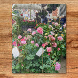 Rose Puzzle<br><div class="desc">Dieses Rätsel enthält ein Foto eines Verkaufsstandes von rosa Rosen auf einem französischen Markt.</div>