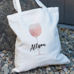 Rosé Wine Bridesmaid Wedding Brautparty Tragetasche<br><div class="desc">Rosé den ganzen Tag Tote Tasche,  mit einem Aquarellbild eines großen Weinglases. Passen Sie die Namen Ihres Brautparty an,  um einen lustigen Moment von Ihrer Hochzeit zu genießen.</div>