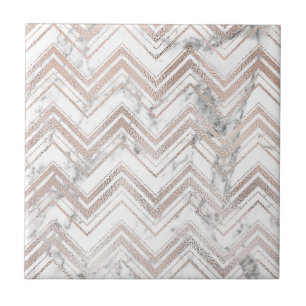 Rosengold- und -marmorzickzack fliese