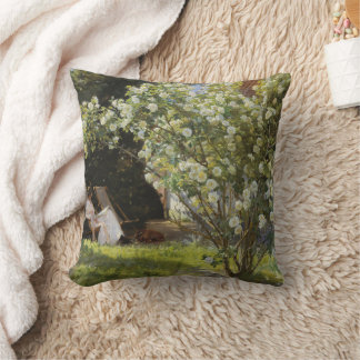 Roses. Marie Krøyer seated in the deckchair Kissen