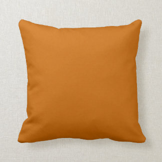 Rostbraun-orangefarbenes Kissen