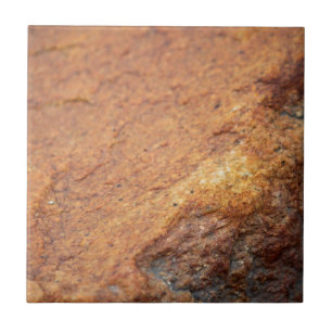 Rostfarbener Granitfels Fliese