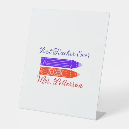 Rot-blaue Stifte, die die beste Lehrerin je geben, Sockelschild (Vorderseite)