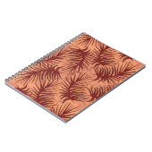 Rot-braune Blätter auf einem Hintergrund mit Motte Notizblock (Linke Seite)