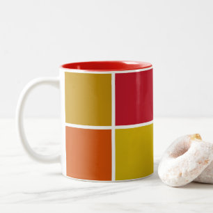Rot-, Gelb-, Gold- und Orangenplätze Zweifarbige Tasse