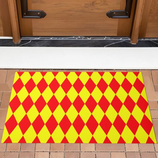 Rot-gelbes Harlekin-Karodesign Fußmatte