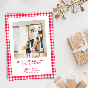 Rot kariertes Weihnachtsfoto für den Umzug in ein Feiertagskarte