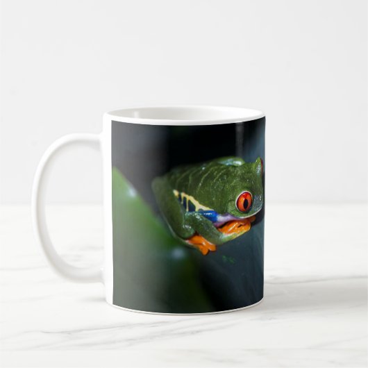 Rot mustert Frosch-Sitzen Kaffeetasse (Links)
