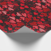 Rot und rosa im schwarzen Hintergrund Geschenkpapier (Ecke)