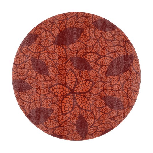 Rot verlässt Muster auf Orange Schneidebrett (Vorderseite)