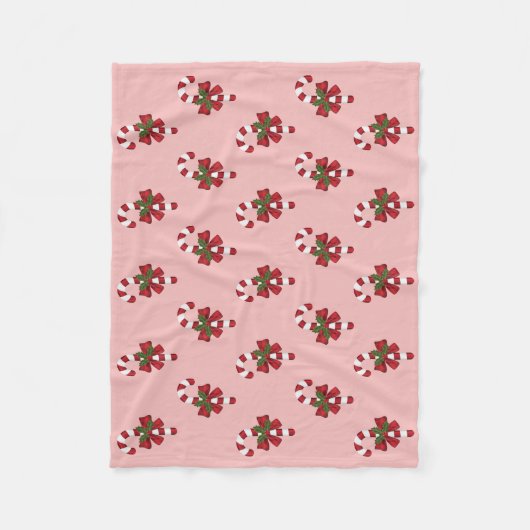 Rot-weiße Weihnachtscreme-Muster auf rosa Fleecedecke (Vorderseite)