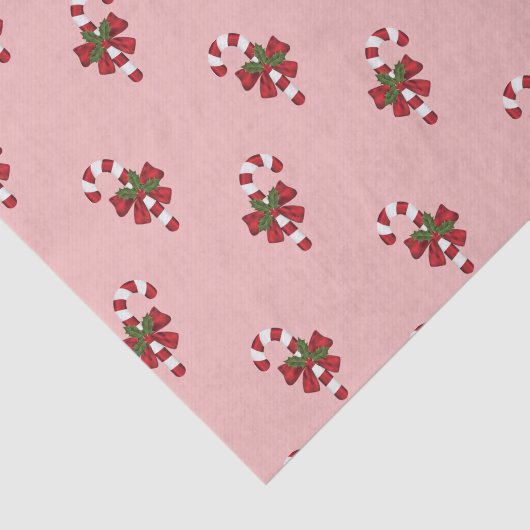 Rot-weiße Weihnachtscreme-Muster auf rosa Seidenpapier (Ausschnitt)