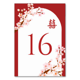 Rotchinesischer Hochzeitsblumenbogen Tischnummer