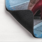 Rote Absatzschuhe auf einem mousepad (Ecke)