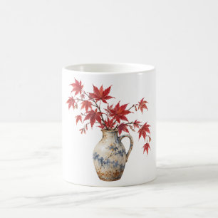 Rote Ahornblätter in einem Keramikkrug Kaffeetasse