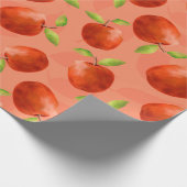 Rote Äpfel auf orangefarbenem Hintergrund Geschenkpapier (Ecke)