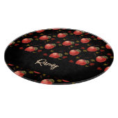 Rote Äpfel und Blätter auf schwarz Schneidebrett (Ecke)