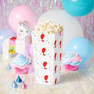 Rote Ballons und Konfetti aus Party Geschenkschachtel