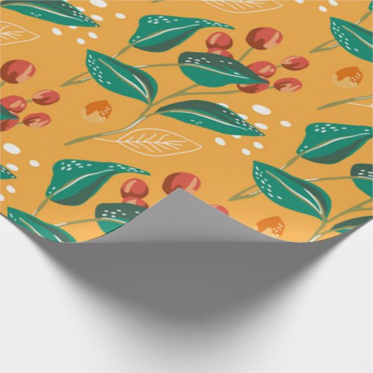 Rote Beere und grüne Blätter auf gelbem Muster Geschenkpapier (Ecke)