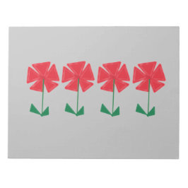 rote Blume auf grauem Hintergrund kleine Geschenke Notizblock