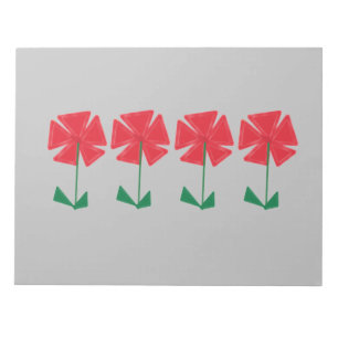 rote Blume auf grauem Hintergrund kleine Geschenke Notizblock