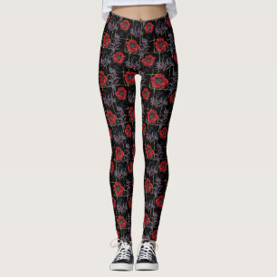 Rote Blume auf schwarz. Leggings