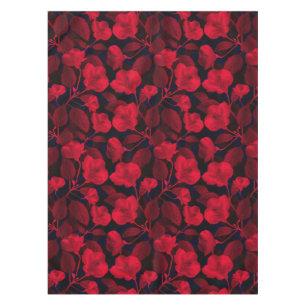 Rote Blume auf schwarz Tischdecke
