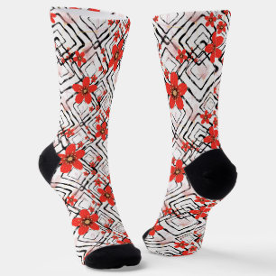 Rote Blume auf weißem, schwarzem Hintergrund. Socken