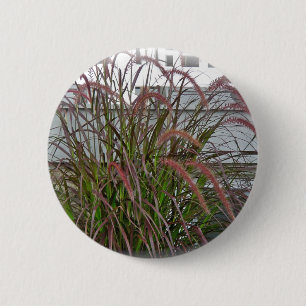 Rote dekorative Graskoordinierungselemente Button