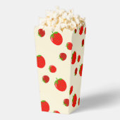 Rote Erdbeere auf Rosa Geschenkschachtel (Geplatzt)