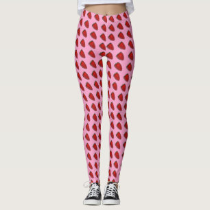 Rote Erdbeeren auf rosa Leggings