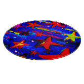 Rote farbige Sterne. Jetzt kaufen Schneidebrett (Ecke)