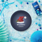 Rote festliche Weihnachtsmannmütze auf Blau mit be Pappteller (Party)