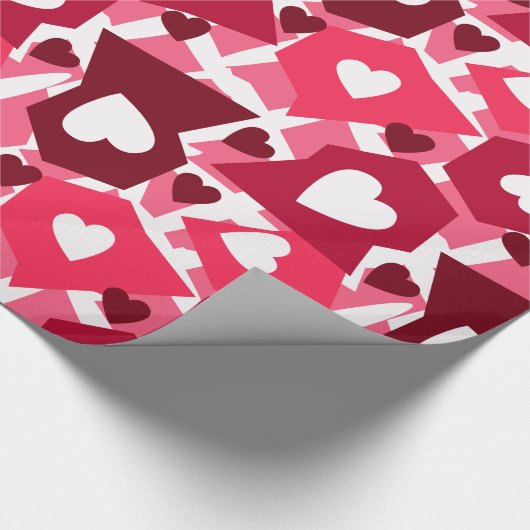 Rote Formen mit weißem Herzen Geschenkpapier (Ecke)