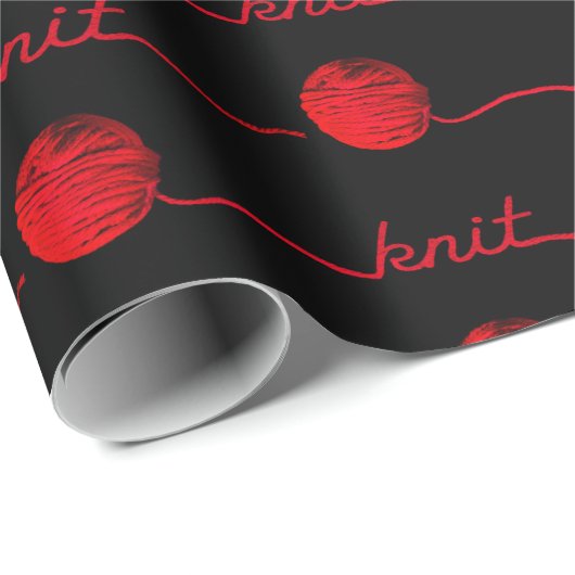 Rote Garnkugel mit Strick Geschenkpapier (Rolleneckpunkt)