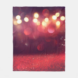 Rote glitzernde Vintage-Lichter Hintergrund. unsch Fleecedecke