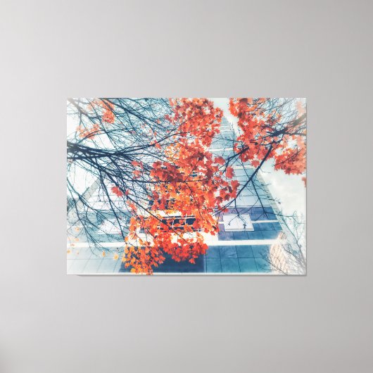 Rote Herbstuntergänge und städtisches Gebäude Leinwanddruck (Vorderseite)