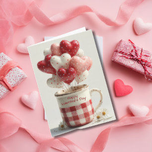 Rote Herzballons in einer Tasse Valentinstagskarte Feiertagskarte