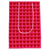 Rote Herzen auf Rosa Mittlere Geschenktüte (Rückseite)