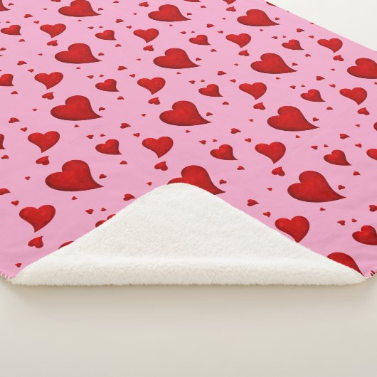 Rote Herzen auf Rosa Sherpadecke (3/4)