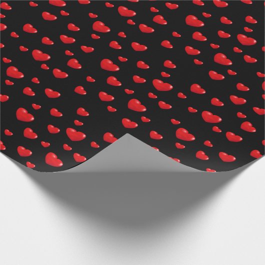 Rote Herzen auf schwarz Geschenkpapier (Ecke)