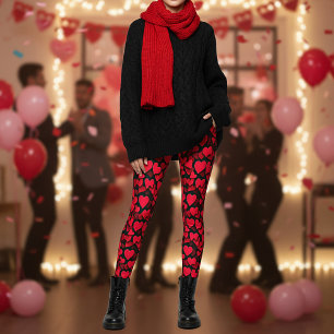 Rote Herzen auf schwarzer Valentinskarte Leggings
