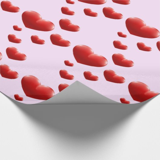 Rote Herzen regnen auf rosa Wrapping Paper Geschenkpapier (Ecke)