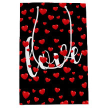 Rote Herzen und Liebe auf schwarz