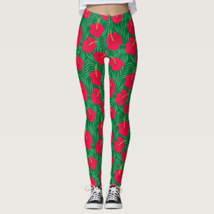 Rote Hibiskusblüten auf grünen tropischen Blättern Leggings